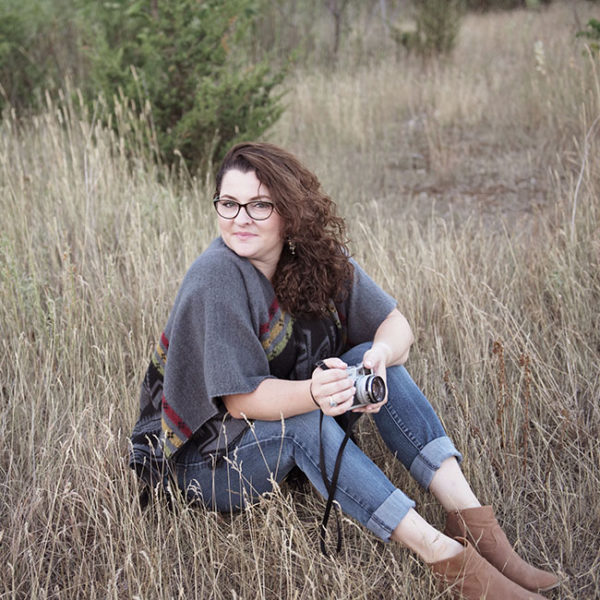 wedding photographer jessica little photography sitting with camera in her hand