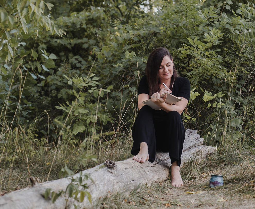 Jess journaling outdoors